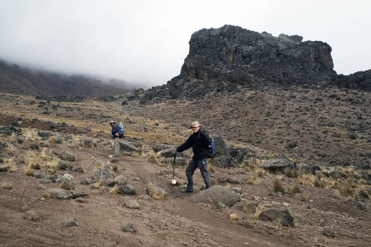 Trekkers below Lava Tower at 4,630 m, the acclimatisation high point on Kilimanjaro climbing tours